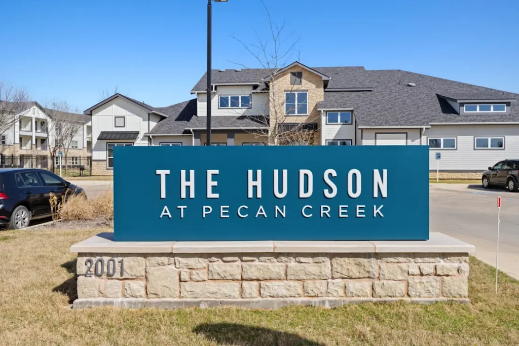 The Hudson at Pecan Creek — property entrance sign
