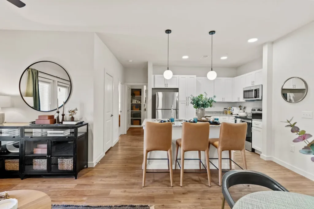 The Hudson at Pecan Creek — kitchen and living area